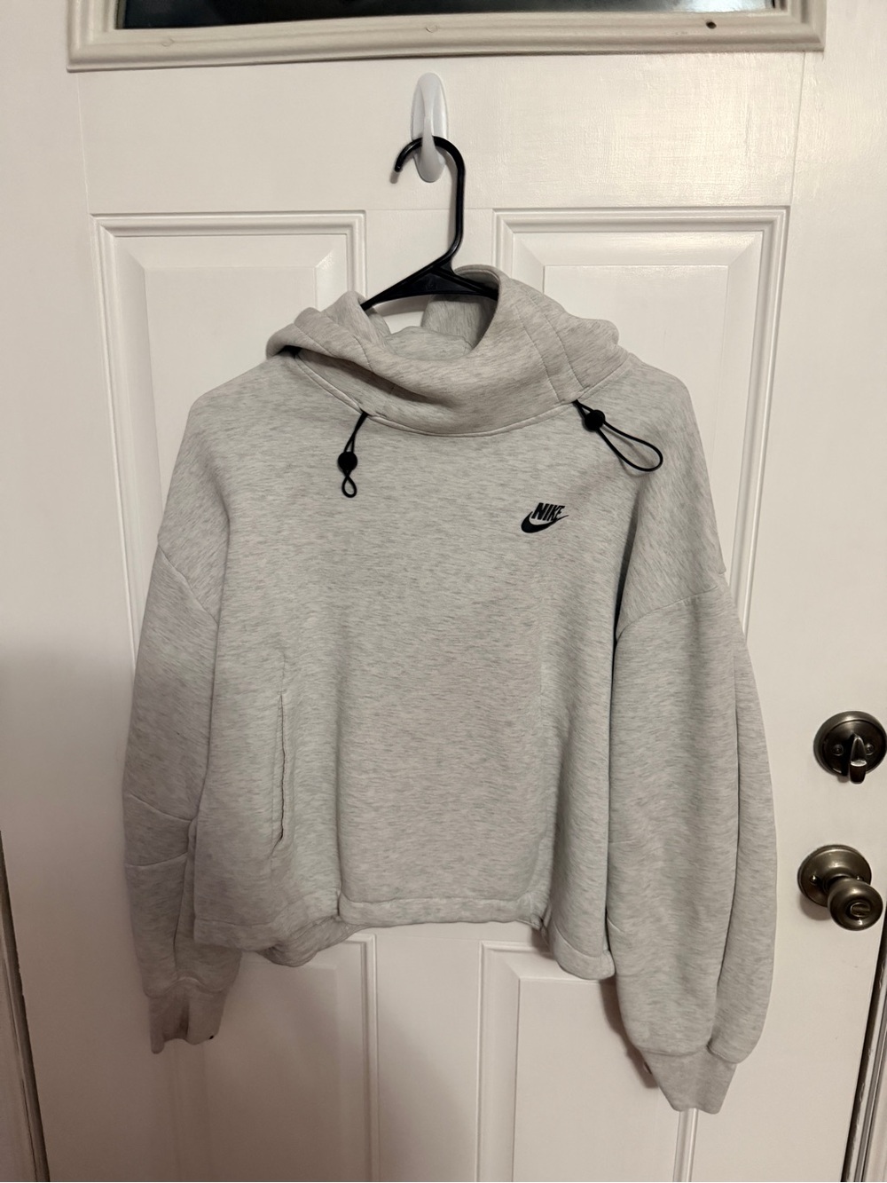 Nike Light Gray Pullover Hoodie with Black Swoosh Accents